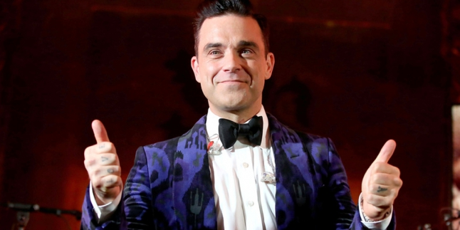 Reuni Bareng Take That, Robbie Williams Balik Jadi Boyband Lagi?